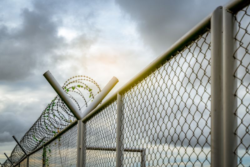 Chain Link Fence with Barbed Wire