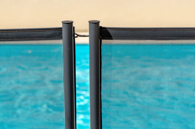 Removable Mesh Pool Fence in Use